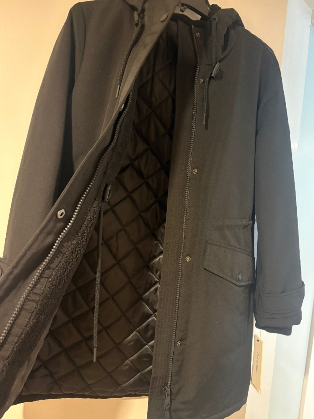 Calvin Klein warm all-weather coat in black, size XS.
